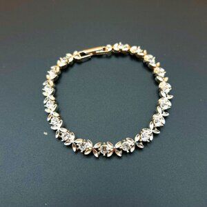 Vintage Avon Silver Tone Rhinestone Tennis Bracelet – Floral Vine Design, Signed